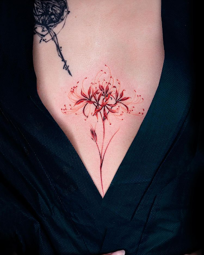 The spider lily tattoo uses red tattoo ink